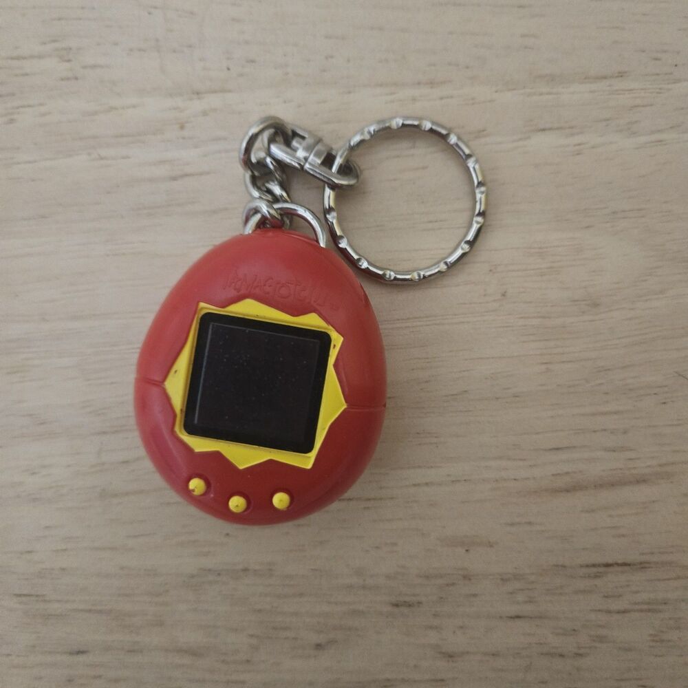 Bandai Vintage 1997 McDonald's Tamagotchi Keychain White with Red Figure